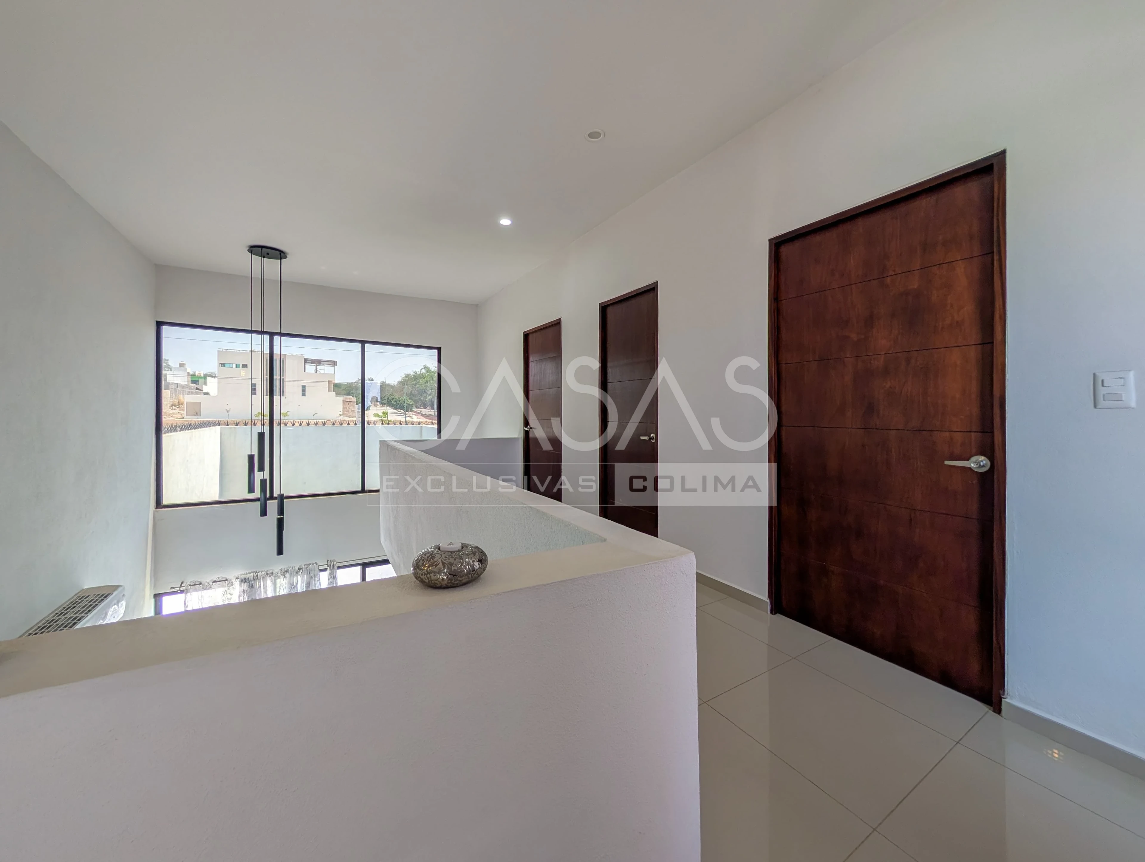 Hermosa casa en venta al norte de Colima, recamara en planta baja y porton 11